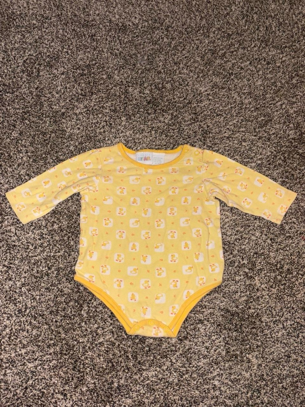 Vintage Y2K Yellow baby bodysuit with duck pattern, size 6-9 months